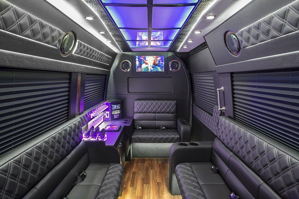 Limo Sprinter lounge-style seating with ambient lighting